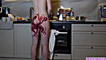 Sexy, tattooed wife ignores you while cooking