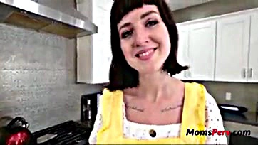 Jane's stepmom wanks her cock in the kitchen