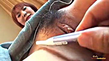 Woman allows husband to shave her pubic area