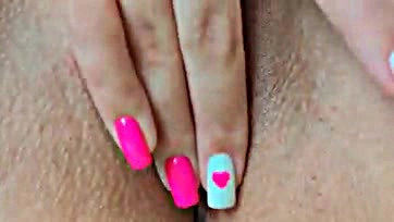 Teen girl wanks her vulva in explicit close-up