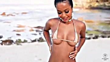 Woman flaunts her bare, rounded breasts publicly