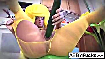 Fucking hell, a chick's dressing up with a ginormous zucchini