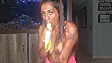 Indian woman pleasures herself with fruit