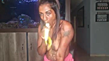 Indian woman pleasures herself with fruit