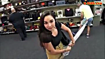 Coed exposes breasts at pawn shop for cash