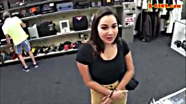 Coed exposes breasts at pawn shop for cash