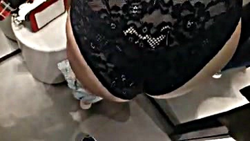 Excited couple has public sex in fitting room