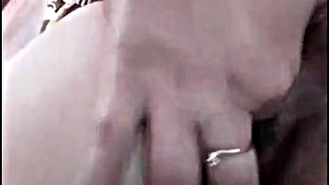 Aunty strips, masturbates solo in explicit video