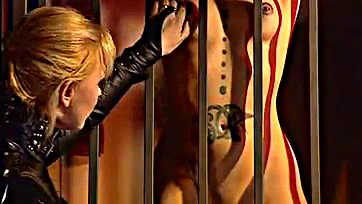 Lesbians engage in lesbian BDSM fetish play