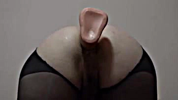 Deep penetration of massive toy into plump anus