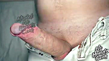 Man wanks big cock, shoots loads of cum