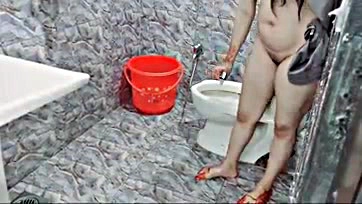 Desi woman shaves pubic area and urinates before Eid