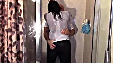 Black woman grinds on white man in shower