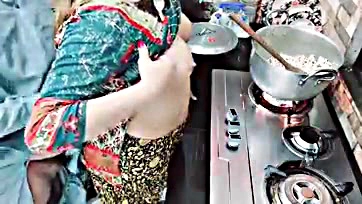 Wife cooks while husband secretly anally penetrates her