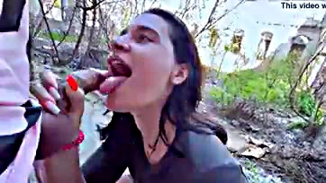 Public oral sex with cum in a crowded outdoor setting