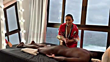 Asian masseuse gives black man a hot blow job