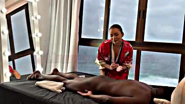 Asian masseuse gives black man a hot blow job