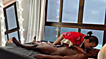 Asian masseuse gives black man a hot blow job