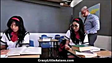 Asian teens threesome with white teacher in classroom