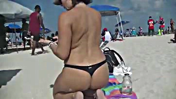 Hubby films wife getting face-fucked by a beach stud