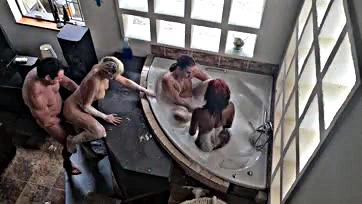 Group orgy involving blowjobs, sex, and spa bath