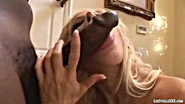 Gina Lynn deep throats and pounds a black cock