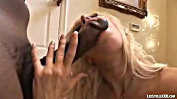 Gina Lynn deep throats and pounds a black cock