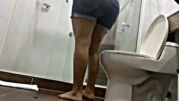 Public toilet has hidden camera and sexy ass