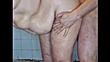 Old granny gets intimate under shower, fingers ass