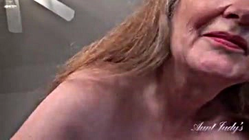 A mature stepmom gives a senior blow job