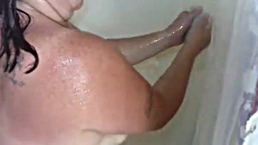 BBW gets cum-covered face in shower