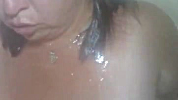 BBW gets cum-covered face in shower