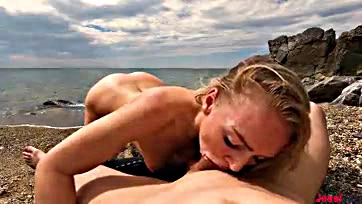 Deepthroat cum swallow on beach, explicit oral sex