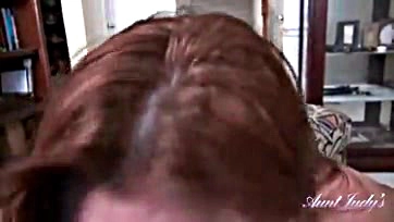 A 48-year-old redhead sucks cock in POV