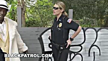 Two female officers rough up a black pimp