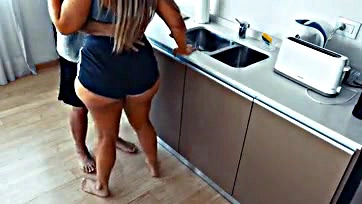 Stepmom's big ass can't resist kitchen sex