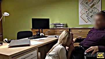 Office agent performs oral sex on blonde