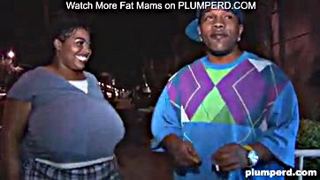 A black man has sex with a large woman