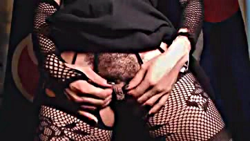 Explicit content: hairy pussy, asshole, and fishnets