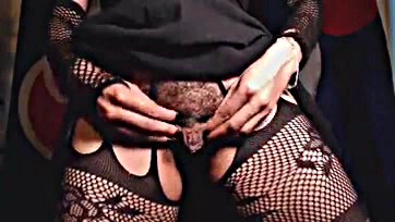 Explicit content: hairy pussy, asshole, and fishnets