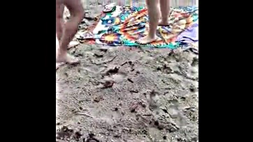 Sexy wife gives guide a beach butt show