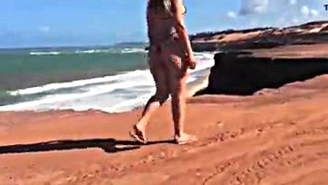 Sexy wife flaunts big booty on deserted beach