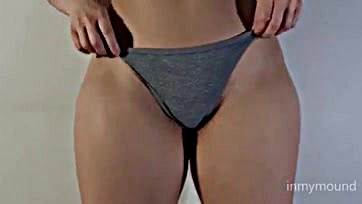 Big booty shows off shaved pubic area and camel toe