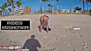 Hotwife walks beach, flaunting all, very nasty