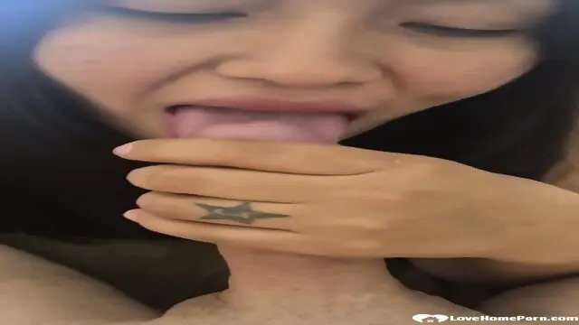 Pretty Asian Co-worker Sucking White Dick