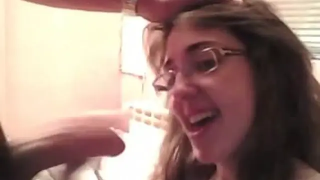 An amateur girl in glasses gets a fuck and a facial 