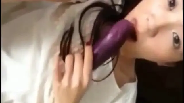 Hot korean teen masturbates using eggplant