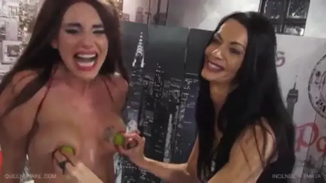 Older brunette woman heats the tits and pussy of another one