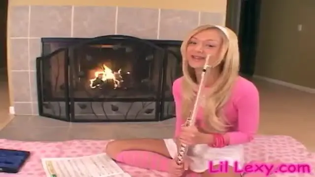 Teen masturbates hard by sticking a flute up deep