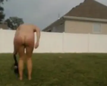 I film my girlfriend naked in the back yard